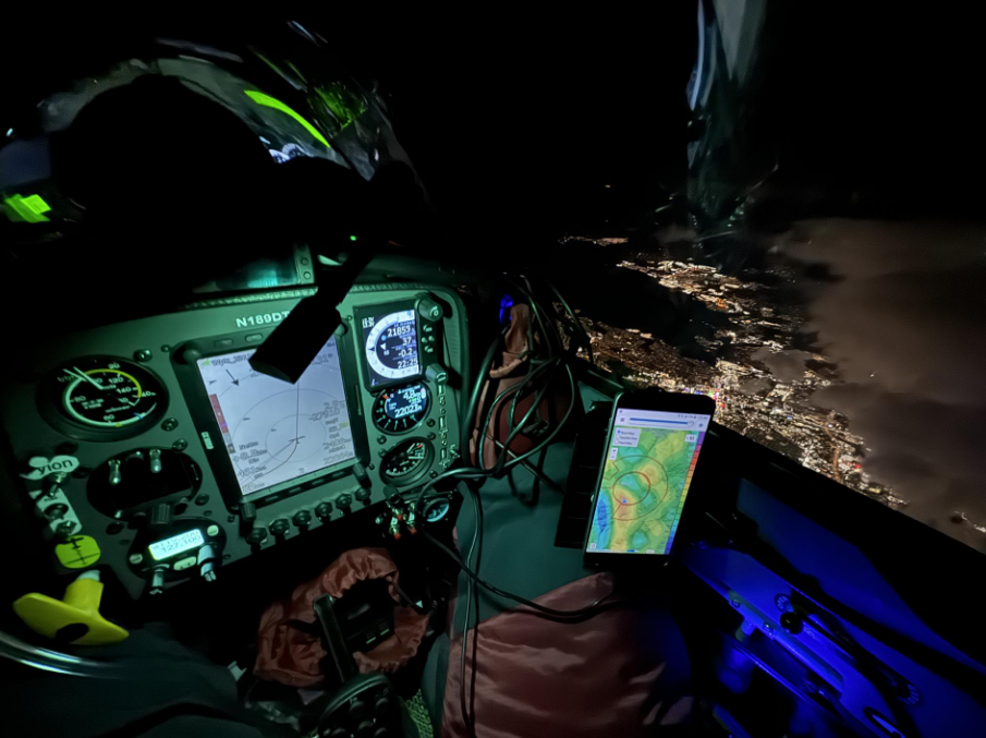 Boettger Gordon in cockpit by night